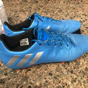 Blue Addidas soccer cleats (Messi style)